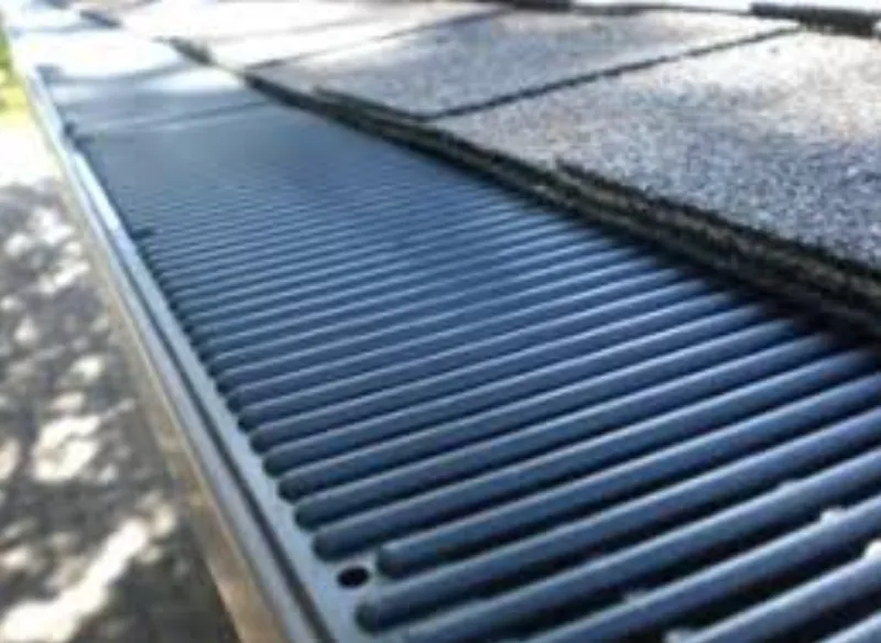 Close up of a gutter guard installed on a home